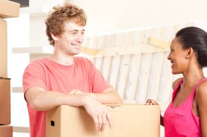 Medford, MA Real Estate – Couple unpacking boxes