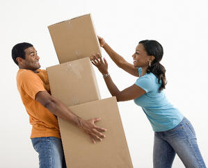 man-carrying-boxes-with-woman-thumb-1600x1295-136303