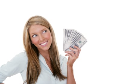 Woman holding cash – Massachusetts mortgage myths