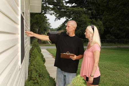 Home Inspector with Woman During a Home Inspection in Massachusetts