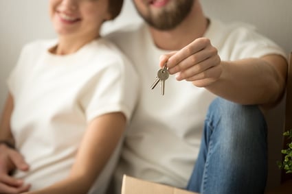 Homebuyers with house keys