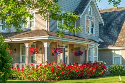 House with farmer's porch, beautiful flowers