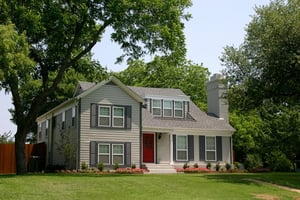 Tan colonial-style home perfect for first-time homebuyers