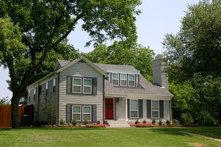 Classic Colonial with a red door. 