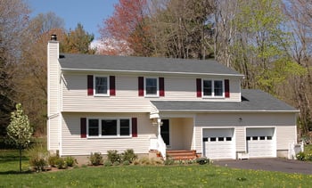 Colonial home with two-car garage. 