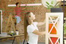 young couple home decor repair renovation brick wall